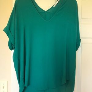Green shirt. Worn once. From Francesca’s